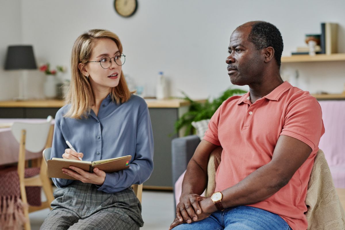 Medicare beneficiary talking about Medicare Advantage with his Medicare advisor